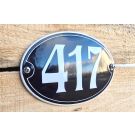 House number oval with frame and colored edge